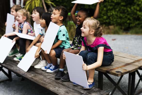 young children doing an activity on a field trip