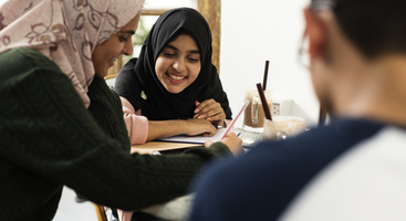 Muslim students studying